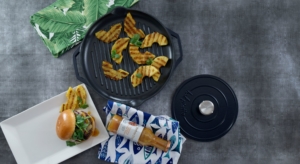 grill with pineapple, plate with a burger