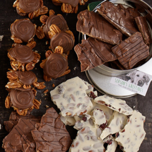 A variety of chocolate with a baking tin