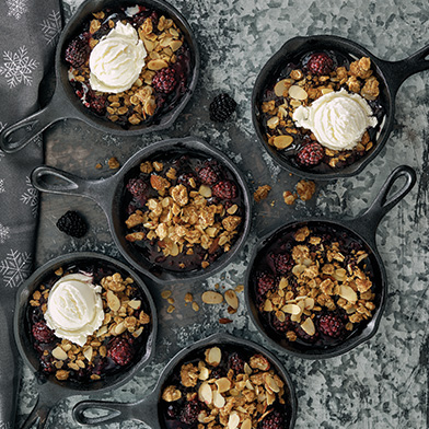 Mini Pies Mini pies in cast iron pans with ice cream