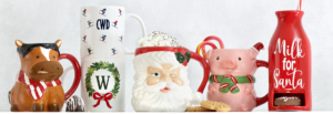 A collection of festive Christmas mugs featuring Santa Claus and a horse design, perfect for holiday beverages.